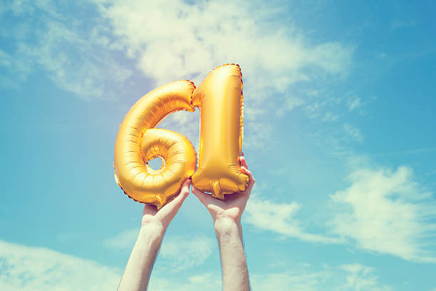 istock Gold number 61 balloon 476365656