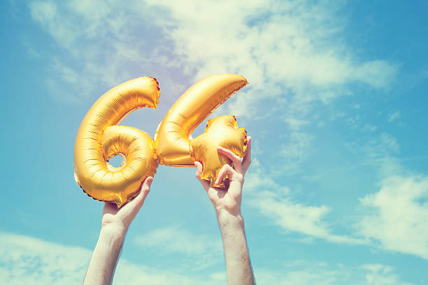 istock Gold number 64 balloon 476365866