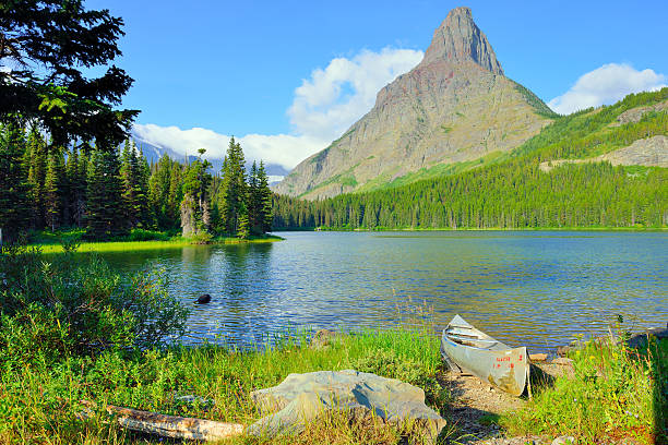 istock Swiftcurrent lake in high alpine landscape 476366508
