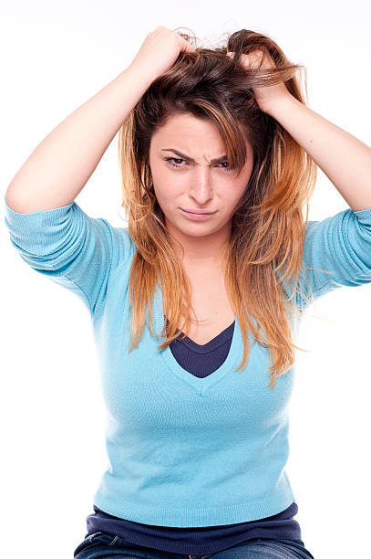 istock Young angry woman on white background 476367025