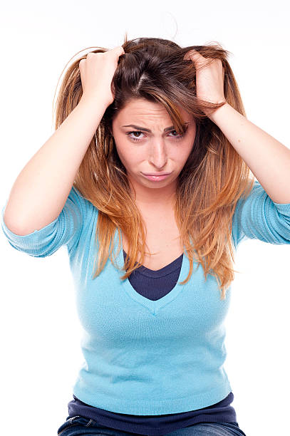 istock Young bored cute woman thinking on white background 476367037