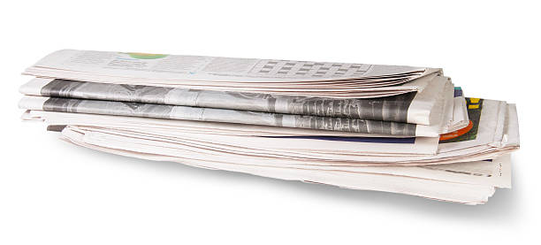 istock Rolled Of The Newspaper 476367599