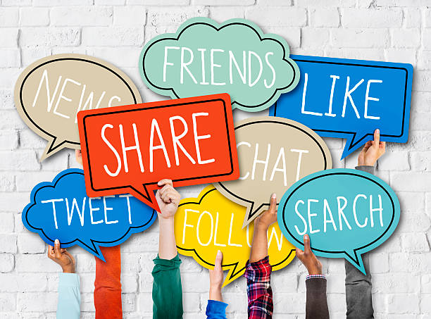 istock Diverse Hands Holding Colorful Speech Bubbles with Words 476374482