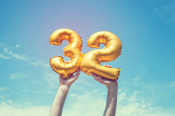 istock Gold number 32 balloon 476375374