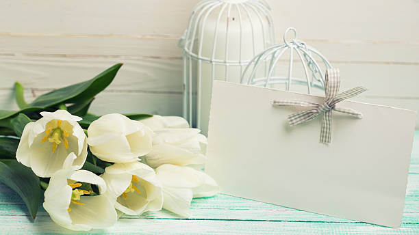 istock Postcard with elegant white  flowers and empty tag 476375530