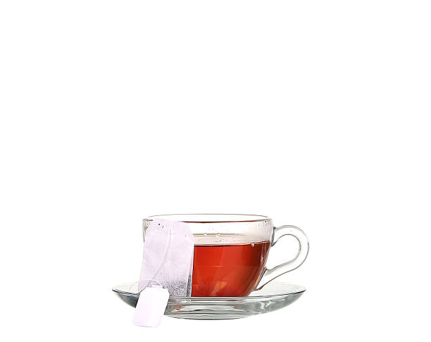 istock Cup of tea with teabag on white background 476379512