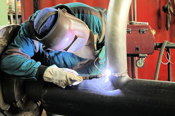 welder welding with mig mag method australian rugby championship stock pictures, royalty-free photos & images