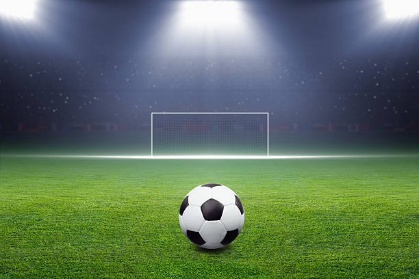 istock Soccer ball, goal, spotlight 476381291