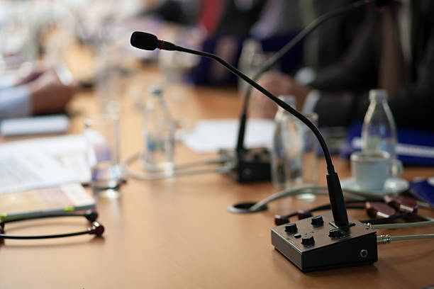 istock microphone at business meeting 476383235