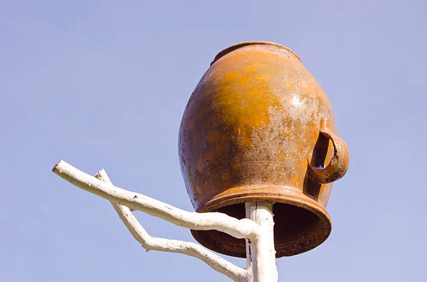 istock vintage clay pot and sky 476383383