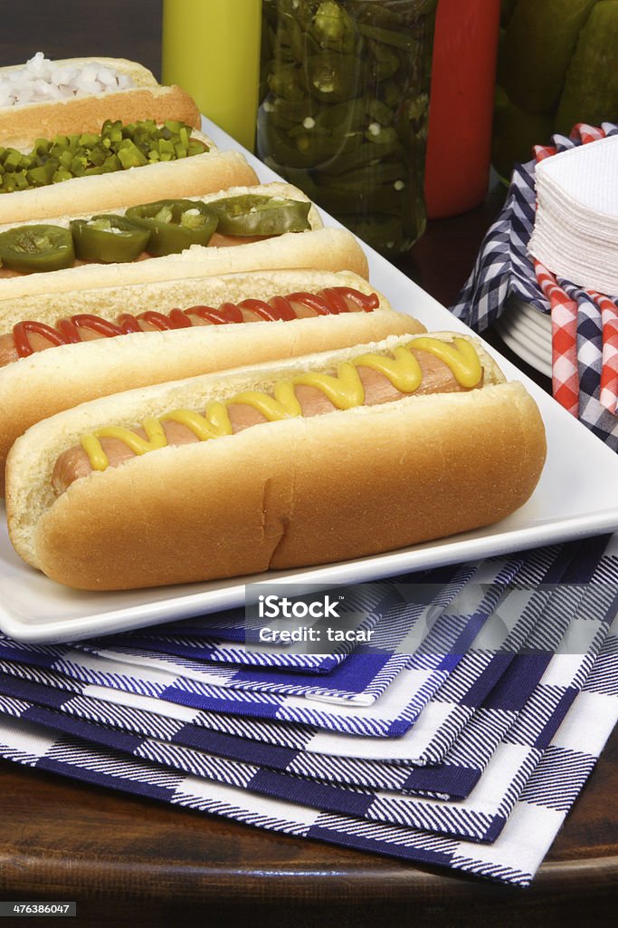 Delicious hot dogs home-cooked hot dogs, perfect fast food meal for your yard barbecue or tailgating party. Bun - Bread Stock Photo