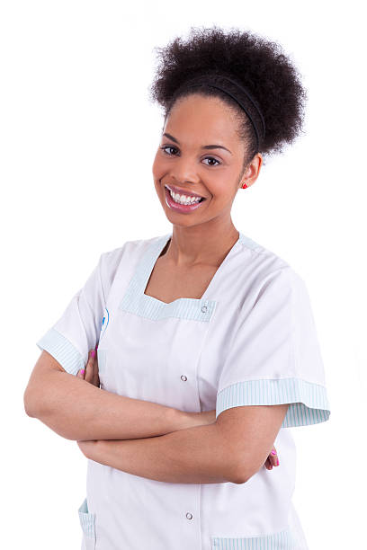 istock Young african american nurse with folded arms 476390843
