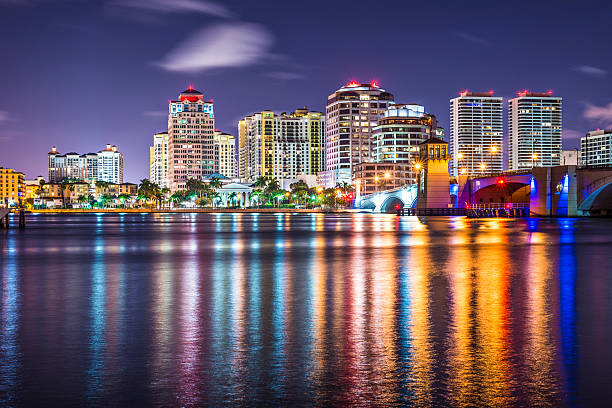 West Palm Beach West Palm Beach, Florida nighttime skyline. west palm beach stock pictures, royalty-free photos & images