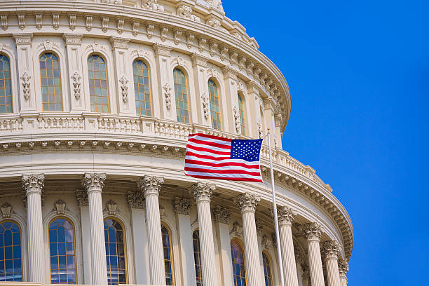 istock Capitol building Washington DC american flag USA 476391908