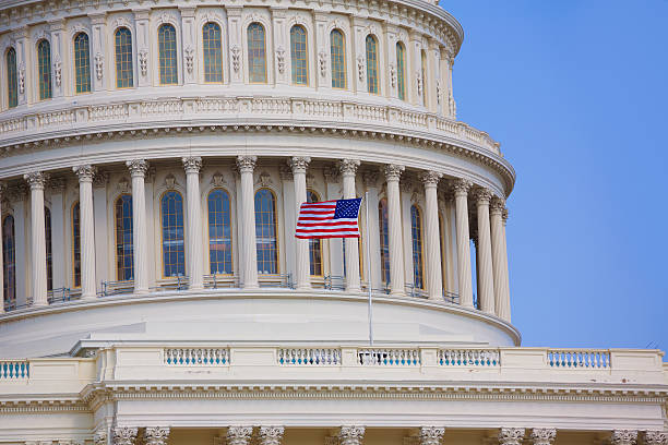 istock Capitol building Washington DC american flag USA 476391932