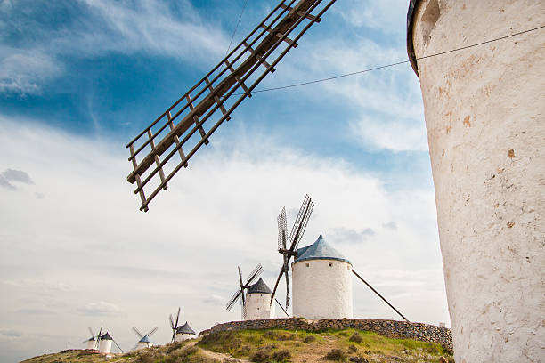 istock Vintage windmills in La Mancha. 476392818