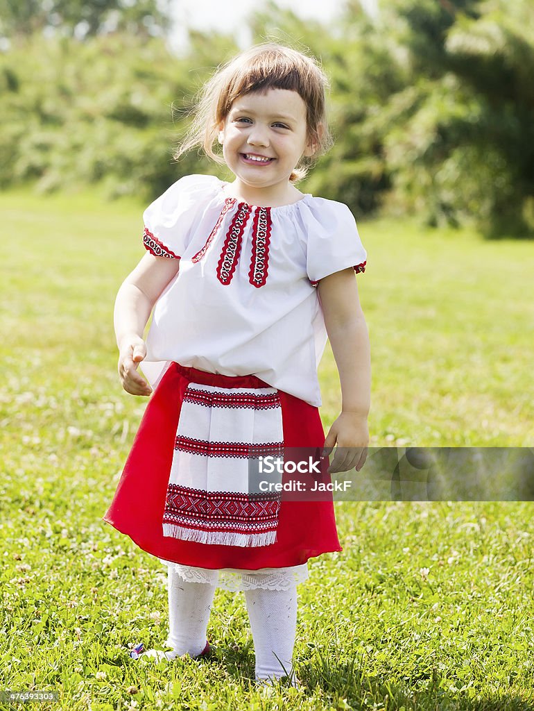 girl in russian folk clothes girl in russian folk clothes on  meadow 2-3 Years Stock Photo