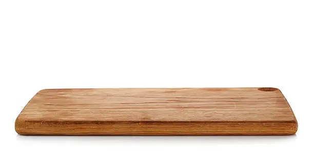 wooden cutting board on a white background