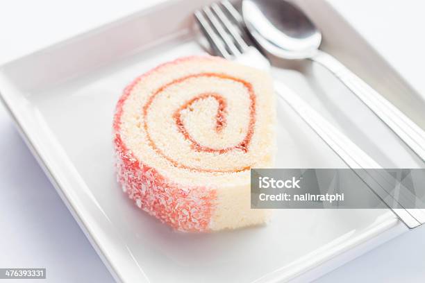 Pink Jam Roll Cake With Spoon And Fork Stock Photo - Download Image Now - Backgrounds, Bakery, Blueberry