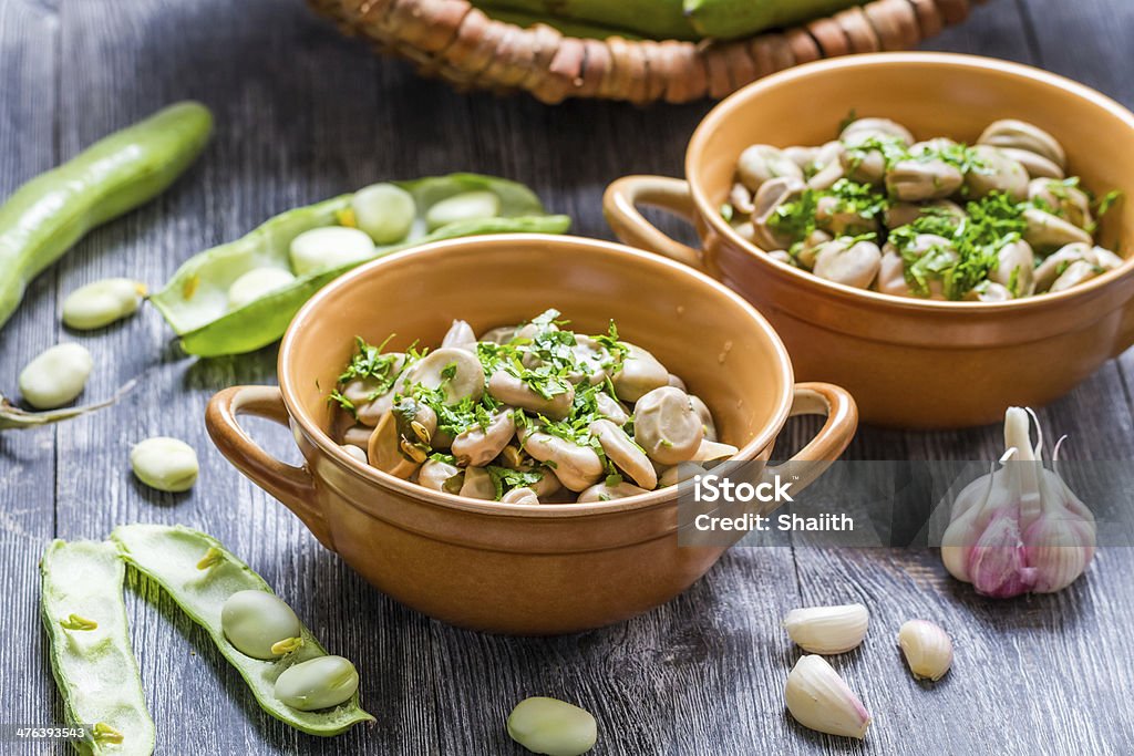 Detalhe de fava, servido com salsa - Foto de stock de Agricultura royalty-free