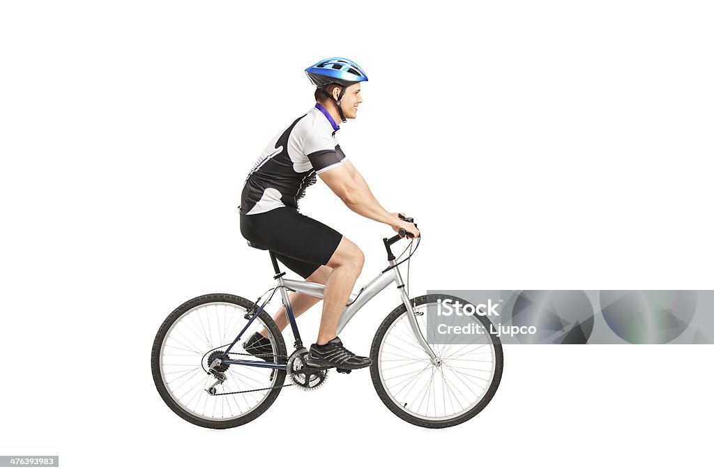 Joven montando bicicleta bicyclist macho - Foto de stock de Andar en bicicleta libre de derechos