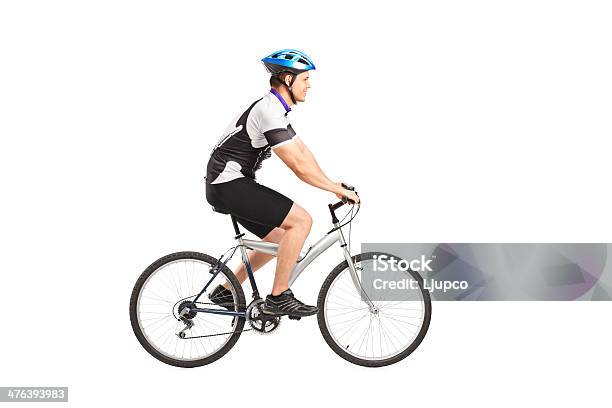 Joven Montando Bicicleta Bicyclist Macho Foto de stock y más banco de imágenes de Andar en bicicleta - Andar en bicicleta, Fondo blanco, Bicicleta