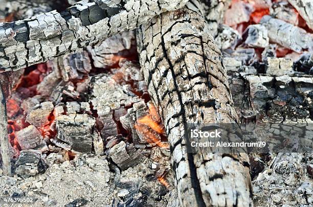 Charred Wood Burning Down In The Fire Glow Closeup Stock Photo - Download Image Now