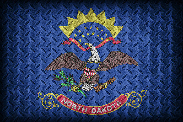 istock North Dakota flag pattern on diamond metal plate texture ,vintag 476395890