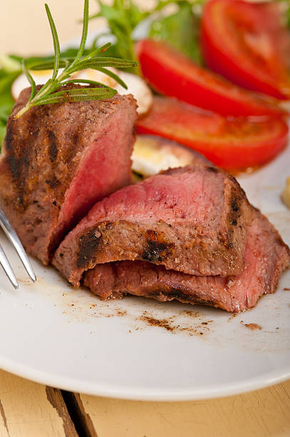 istock beef filet mignon grilled with vegetables 476396050