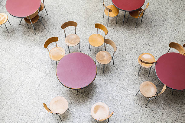 istock Round tables and chairs in an empty cafe interior 476399096