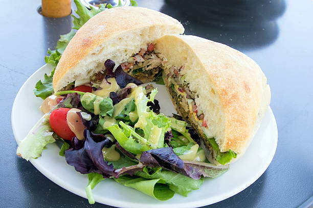 istock Tuna Sandwich with Ciabatta Bread and Salad Closeup 476399355