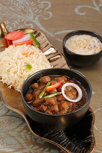 istock Spicy Chickpeas with Rice - Indian Food 476399880