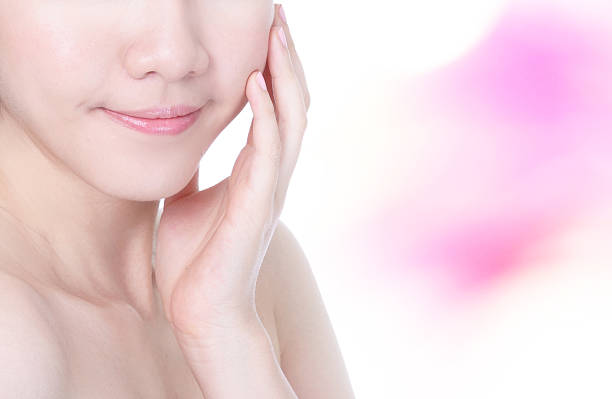 istock Young woman mouth lips and hand touch face 476400243