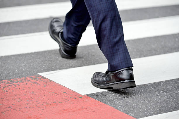 istock Suit crossing street 476402800