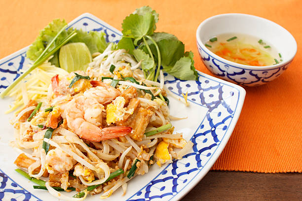 istock stir-fried rice noodles with shrimp 476405765