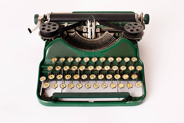 カラー画像の緑、ヴィンテージの手動タイプライター、白色背景 - typewriter typebar retro revival old ストックフォトと画像