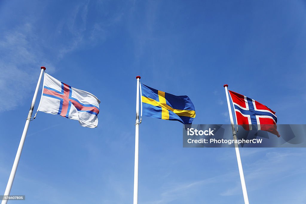 Flags of Faeroe Islands, Sweden and Norway The flags of Faeroe Islands, Sweden and Norway. Blue Stock Photo