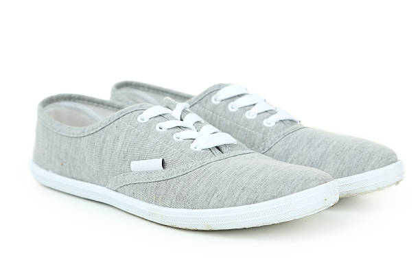 istock Pair of grey shoes isolated on white 476408816