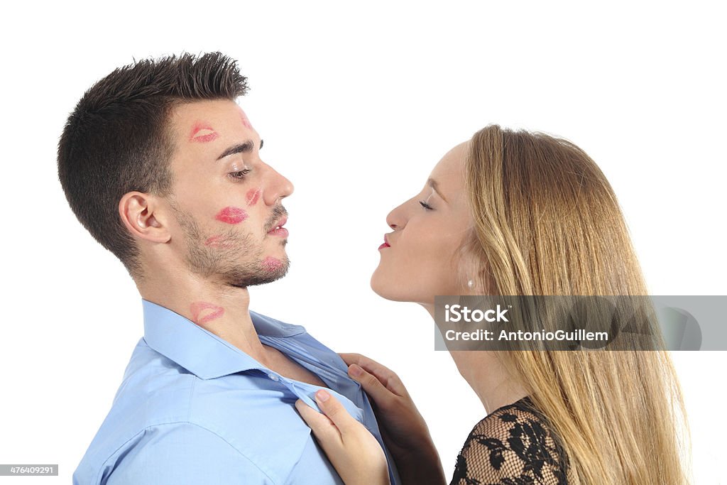 Donna, tentando di Baciare un uomo disperatamente - Foto stock royalty-free di Uomini