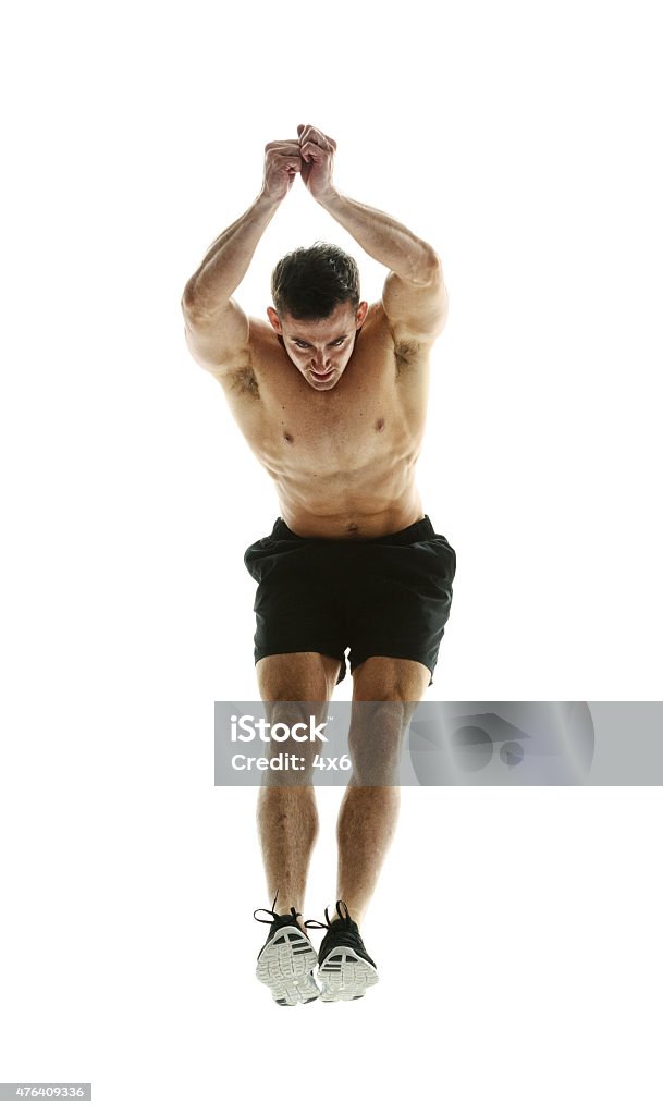 Muscular man exercising Muscular man exercisinghttp://www.twodozendesign.info/i/1.png 20-29 Years Stock Photo