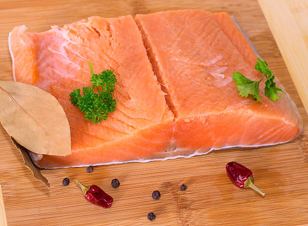 istock Trout fillet on wooden background 476409767