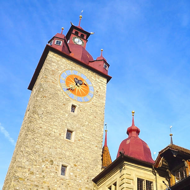 istock clock tower in old town city Lucerne 476412492
