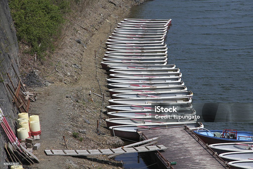 Fishing boats Fishing boats - tens of vessels at a pier in Lake Shojiko, Japan Beach Stock Photo