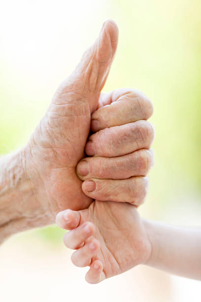 istock Baby And Grandfather 476428028