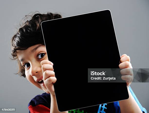 Cute Little Boy With Tablet Pc Stock Photo - Download Image Now - Child, Digital Tablet, Holding