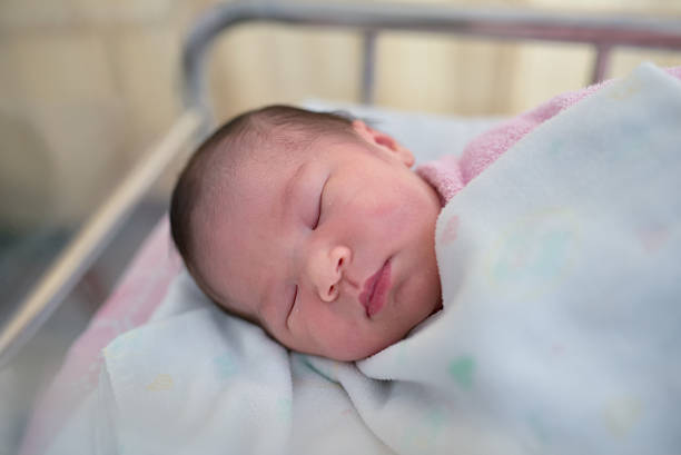 istock cute newborn baby 476431292