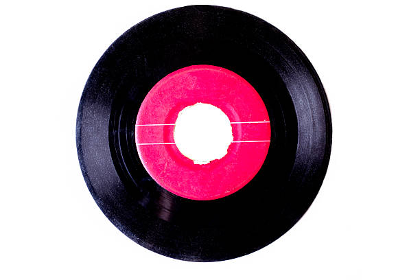 istock 45 RMP record from the 1960s era isolated on white. 476431368