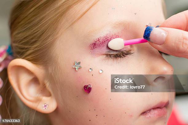 Mother Painting Her Daughter For Carnival Stock Photo - Download Image Now - 6-7 Years, Beautiful People, Beauty