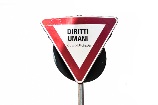 A road sign say to give way to human rights (in italian language and arabic language)