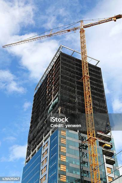 Highrise Building Construction Stock Photo - Download Image Now - Architecture, Building - Activity, Building Exterior